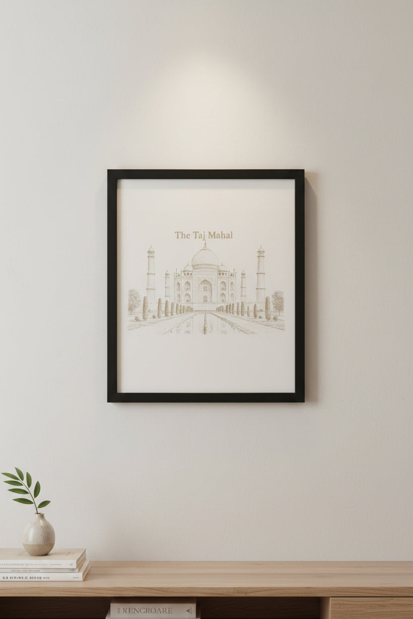 A rectangular art print featuring a brown line drawing of the Taj Mahal with the text 'The Taj Mahal' at the top, displayed on a textured gray fabric surface.