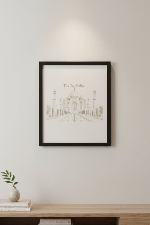 A rectangular art print featuring a brown line drawing of the Taj Mahal with the text 'The Taj Mahal' at the top, displayed on a textured gray fabric surface.