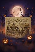 A rectangular wooden plaque with rounded corners, featuring a detailed Halloween-themed engraving and the text 'A LITTLE Halloween in the KITCHEN makes everything Magical', resting on a gray textured fabric surface.