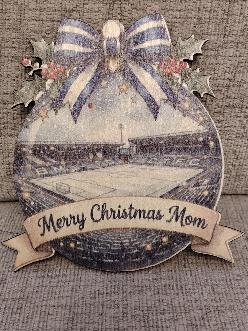 Personalized Christmas tree football stadium decoration.